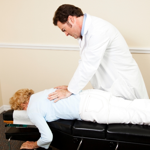 Thompson-Drop-Table-Technique-Symmetry-Chiropractic-and-Physical-Therapy-Duluth-Rosemount-St-Louis-Osseo-MN