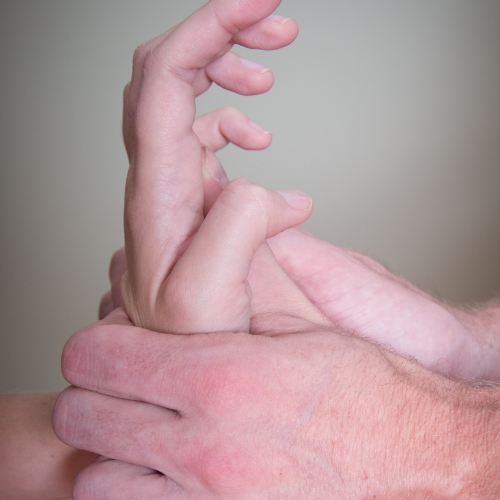 elbow-wrist-and-hand-pain-relief-Symmetry-Chiropractic-and-Physical-Therapy-Duluth-Rosemount-St-Louis-Osseo-MN